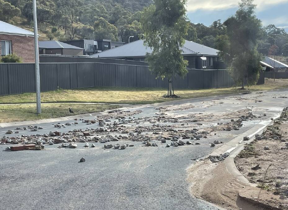 DEBRIS: Rocks that were meant to prevent erosion were brought down the hill and into a new estate. 