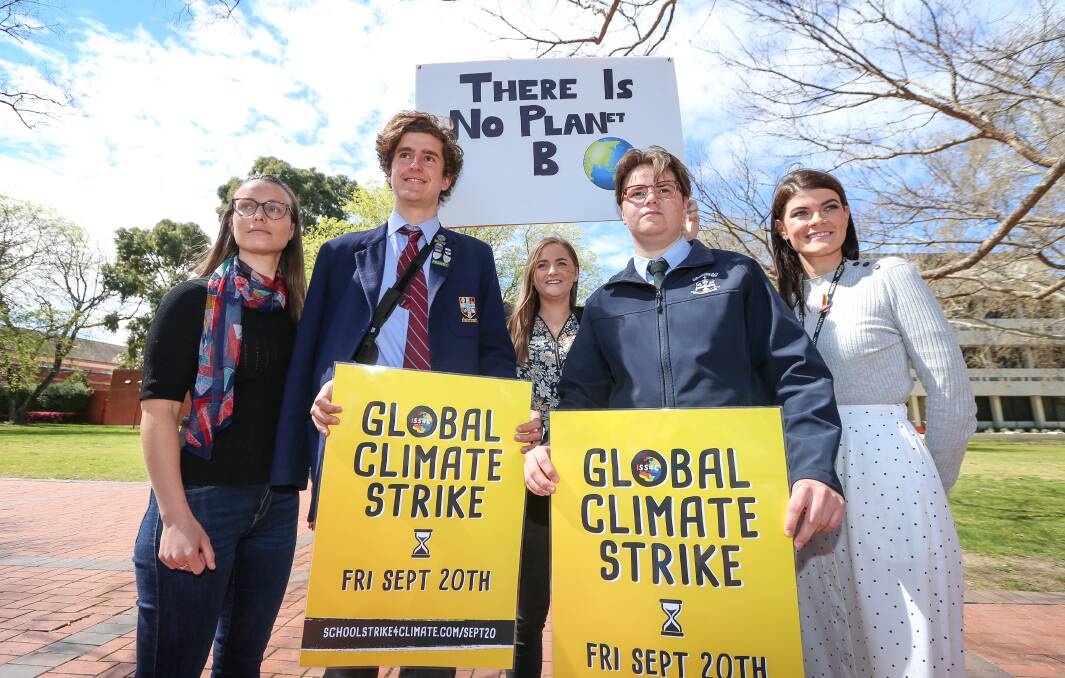 CALL: School Strike 4 Climate's Luca Lamond, 18, and Eli Davern, 15, with Amanda Cohn, Jacqui Hawkins and Kat Bennett. Picture: JAMES WILTSHIRE