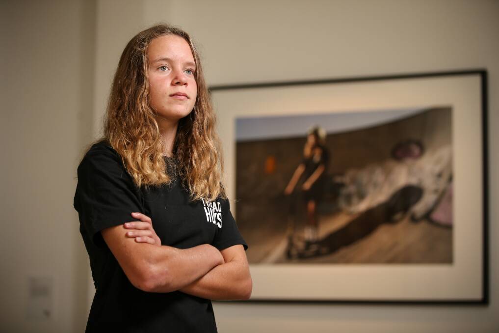 FEARLESS: Sinead Lang started riding scooters as a four-year-old. Now 15, she can call herself a North East Skate Park Series Champion, beating boys aged up to 25 as the only female competitor. She is pictured in Nat Ord's Rise! photography exhibition. Picture: JAMES WILTSHIRE