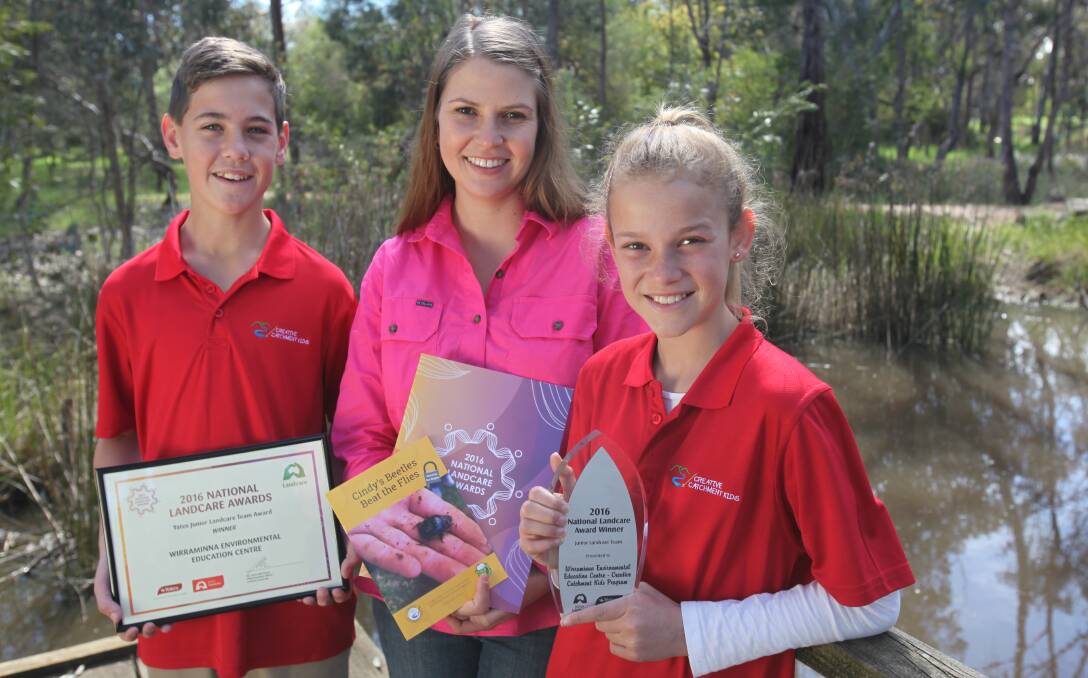 WINNERS: Charlie Doig, 12, Stacee Bell and Joely Scott, 12, represented the Wirraminna Environmental Education Centre in accepting an award.