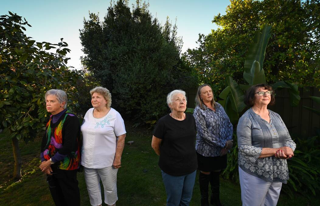 REFLECTING: Dawn Smallpage, Lyn Cardwell, Merle Kelly, Helen Nicholson and Margie Broughton share their experiences of forced adoption. Picture: MARK JESSER