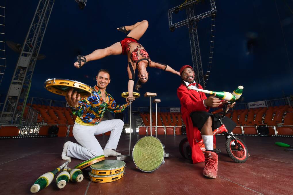 READY TO WOW: Circus Rio performers Rogério Piva, Gabrielle Souza and Will Junior warmed up ahead of opening weekend at Albury Showgrounds. Picture: MARK JESSER