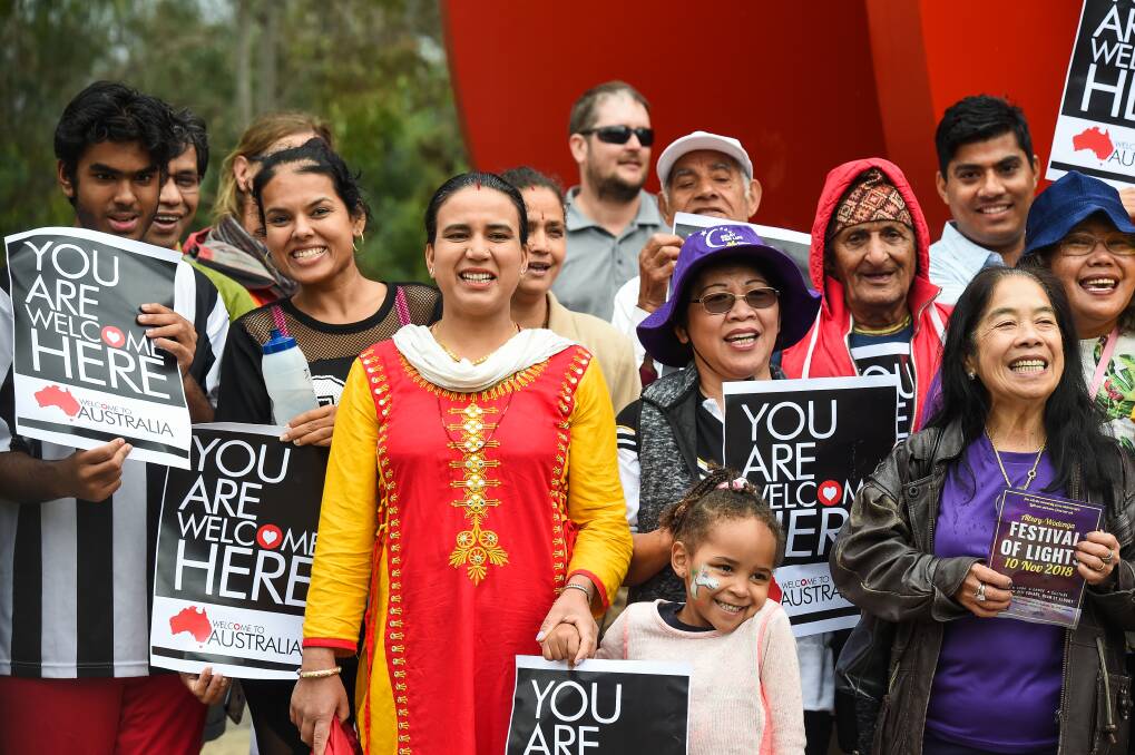 JOINED: The annual 'Walk Together' celebrates multiculturalism and last Saturday, the event celebrated 10 years of Bhutanese settlement on the Border. Picture: MARK JESSER