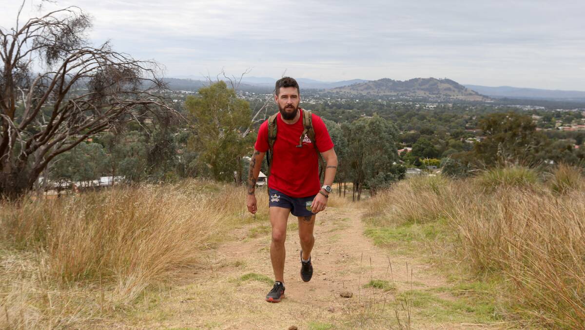 TOO MANY: Veteran Mick O'Keefe, 33, is walking the length of the Kokoda Track on Wodonga's hills to raise money for veterans' mental health. He knows too many lost to suicide. Picture: TARA TREWHELLA