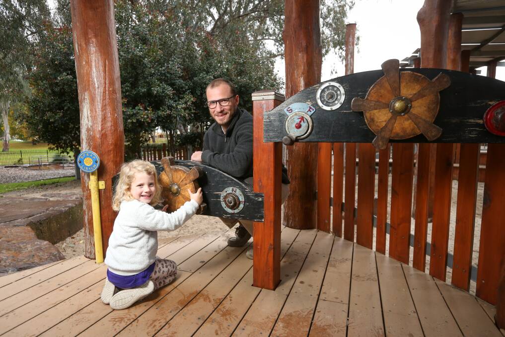 PLAY TIME: Charles Sturt University senior lecturer Brendon Hyndman, spending an afternoon at the playground with his daughter Maisie, 4, is part of a global push advocating the importance of school recess. Picture: JAMES WILTSHIRE