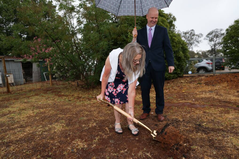 HONOUR: Vicki Bartel and Mercy Connect chief executive Trent Dean planted a tree in memory of Vicki's husband. Picture: JAMES WILTSHIRE
