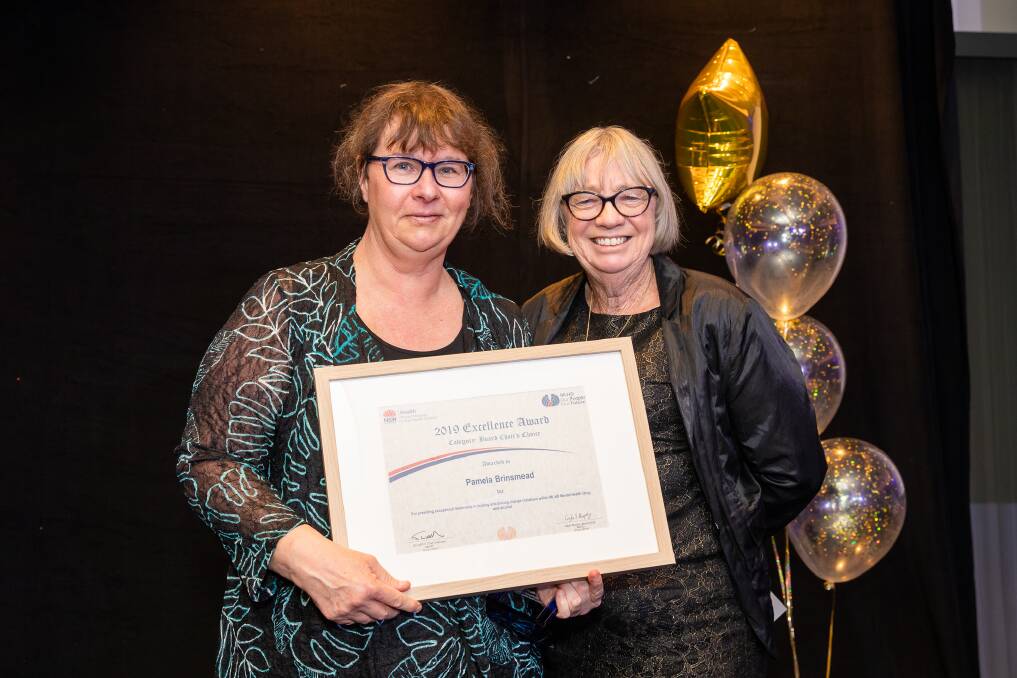 RECOGNISED: Albury-based Pam Brinsmead received the MLHD board chair's choice award on Friday night, from the chair herself, Gayle Murphy.