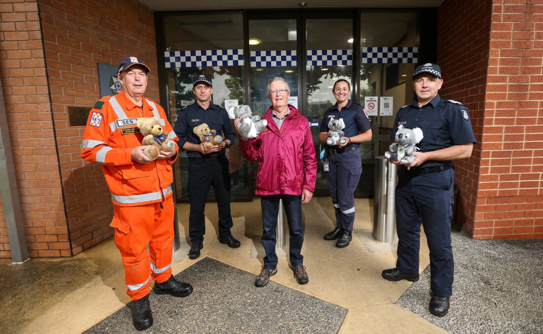 GOOD HOME: Hayden Middlin of SES, officer Shane Martin, Harold Cover of Lions, paramedic Alicia Turnbull and officer Shane Bannerman. Picture: JAMES WILTSHIRE
