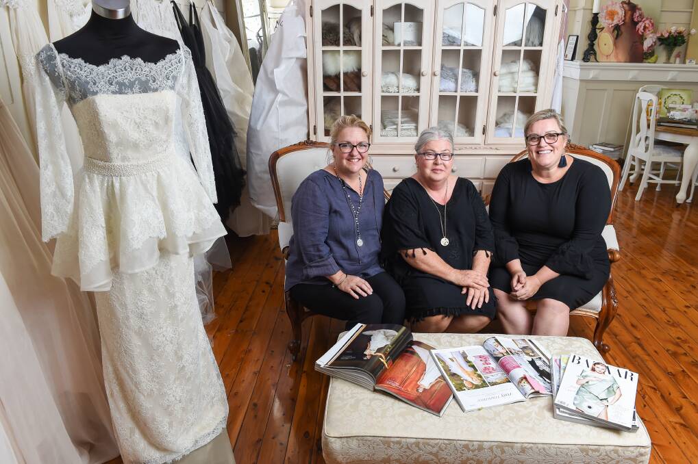 PLANNING: Georgie James is organising the Light and Love Wedding Festival with Samantha Robinson (right). Jillian Franklin's designs will feature. Picture: MARK JESSER
