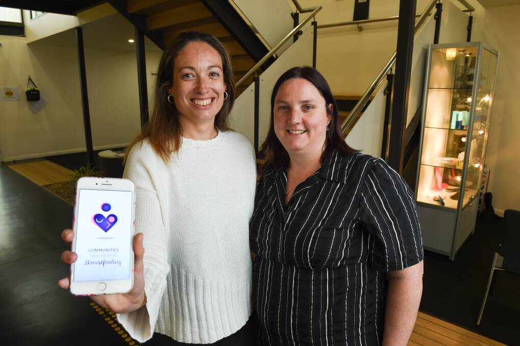 LINKED UP: Jessica Colman and Laura Tonkin have developed an app providing information to breastfeeding mothers. Picture: MARK JESSER