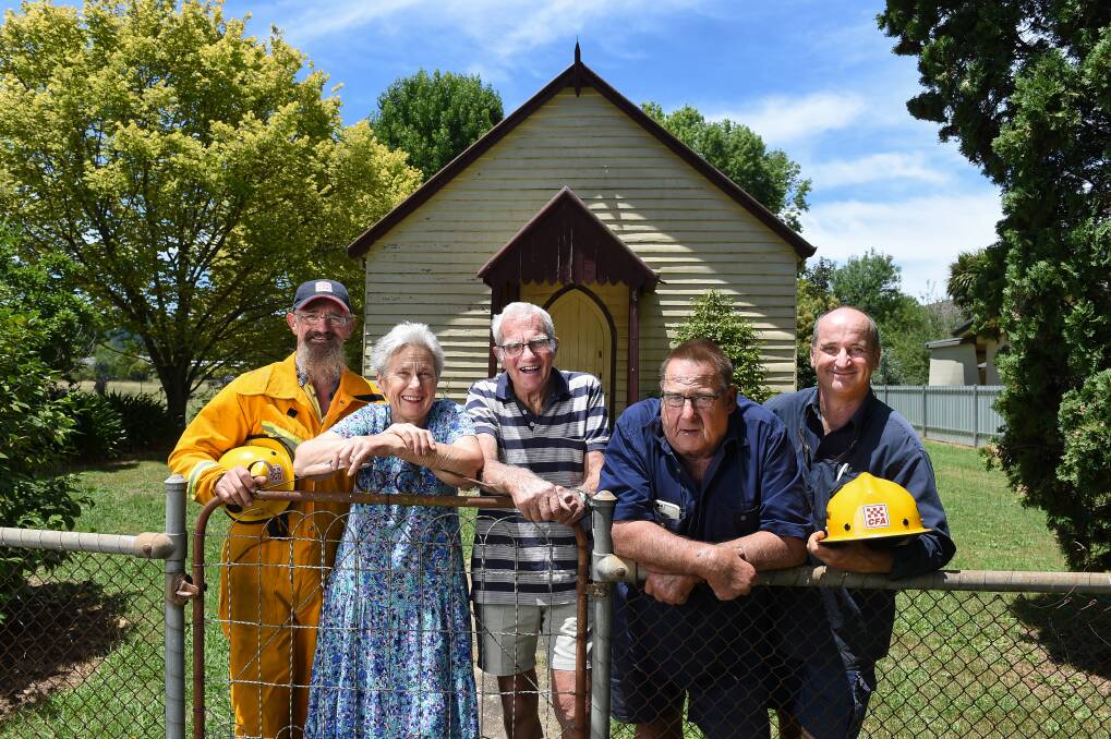GIFT: Peter and Coralyn Steel (middle), are part of the Union Church committee that donated $110,000 to the Porepunkah fire brigade, which includes members Colin Bertuch, Mark Wallace and Mick Dalbosco. Picture: MARK JESSER 