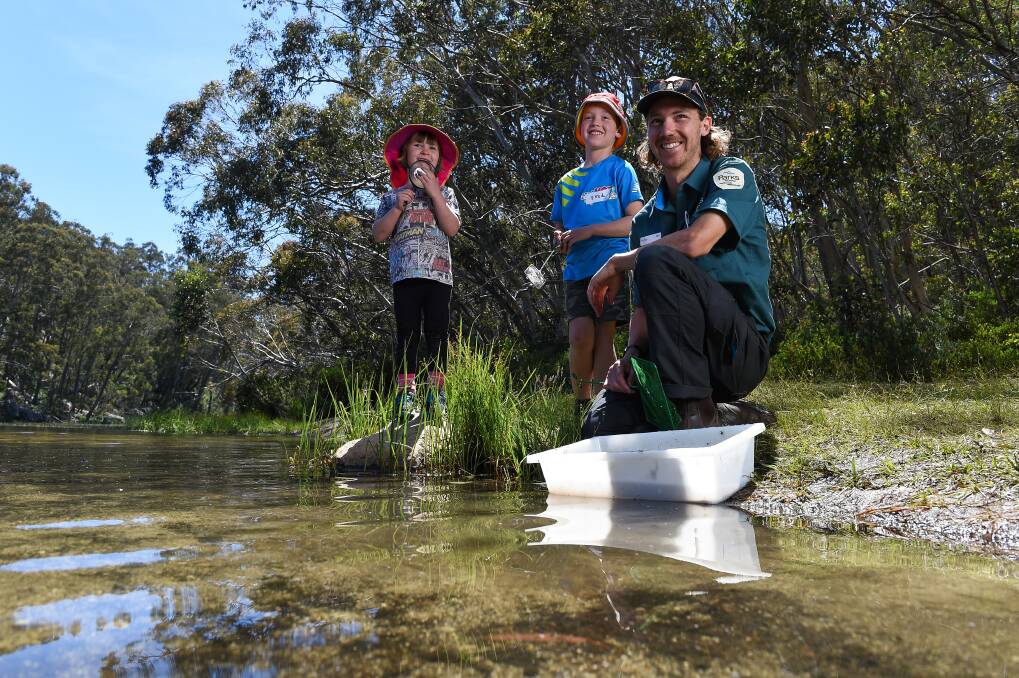 DISCOVERY: Parks Victoria's Sam Doherty led Pippa Farrow, 4, and brother Fred, 7, through the ecosystems of Lake Catani. Picture: MARK JESSER