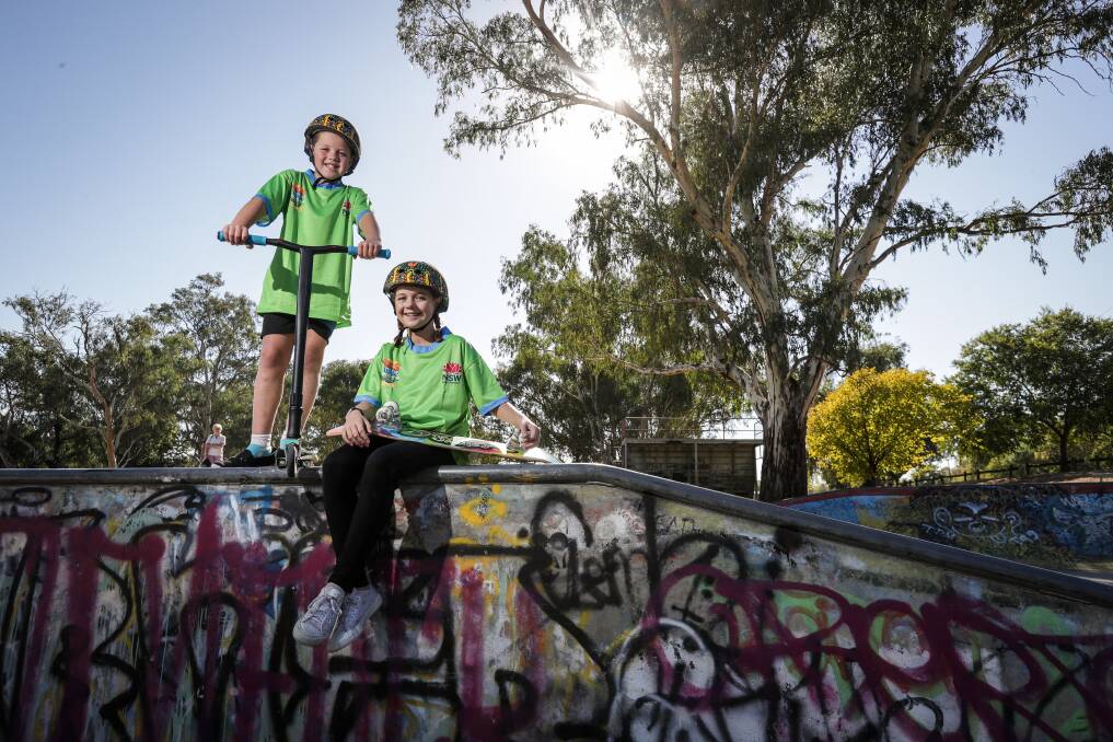 IN THE RINK: Liam Hutchinson, 8, and sister Kate, 10, took part in workshops hosted by RMS in Albury Skatepark. Picture: JAMES WILTSHIRE