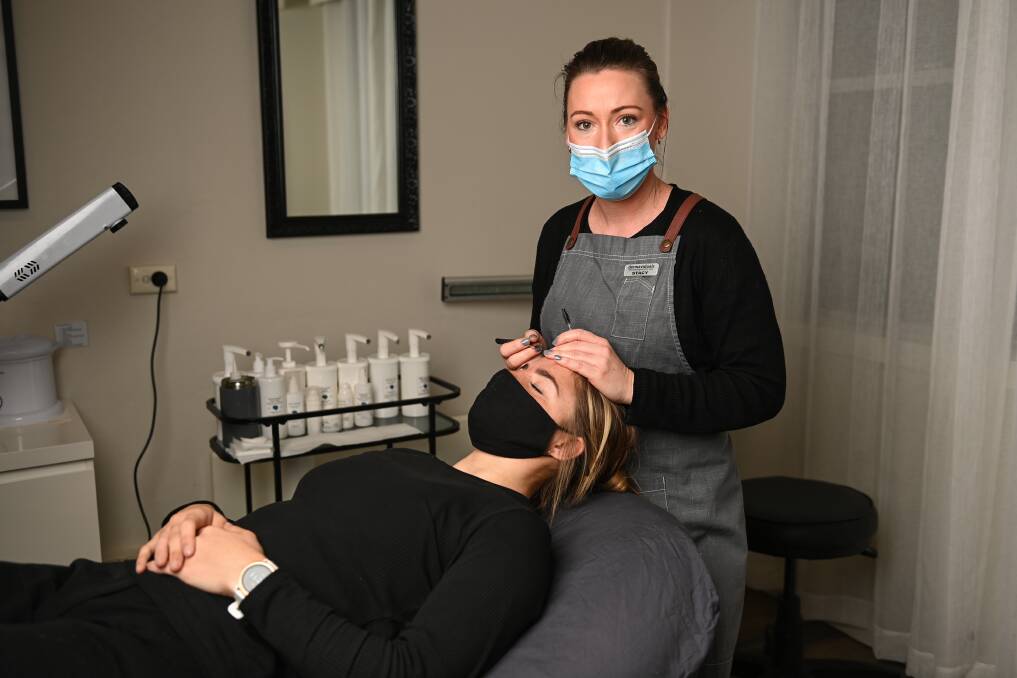 CHANGES: Beauty therapists Chloe Gilcrist and Stacy McQuade of The Silken Dragonfly in Rutherglen have been contacting NSW clients ahead of new border crossing rules coming into place. Picture: MARK JESSER