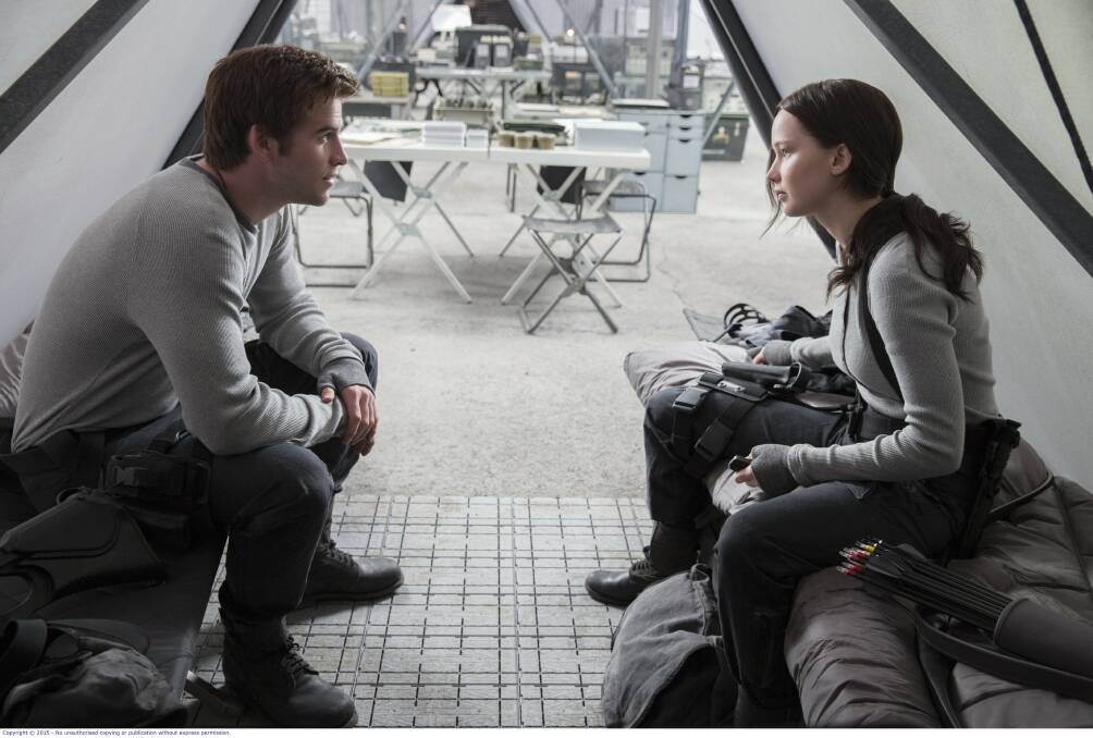  Liam Hemsworth and and Jennifer Lawrence in 'The Hunger Games: Mockingjay Part 2'. Picture: Supplied