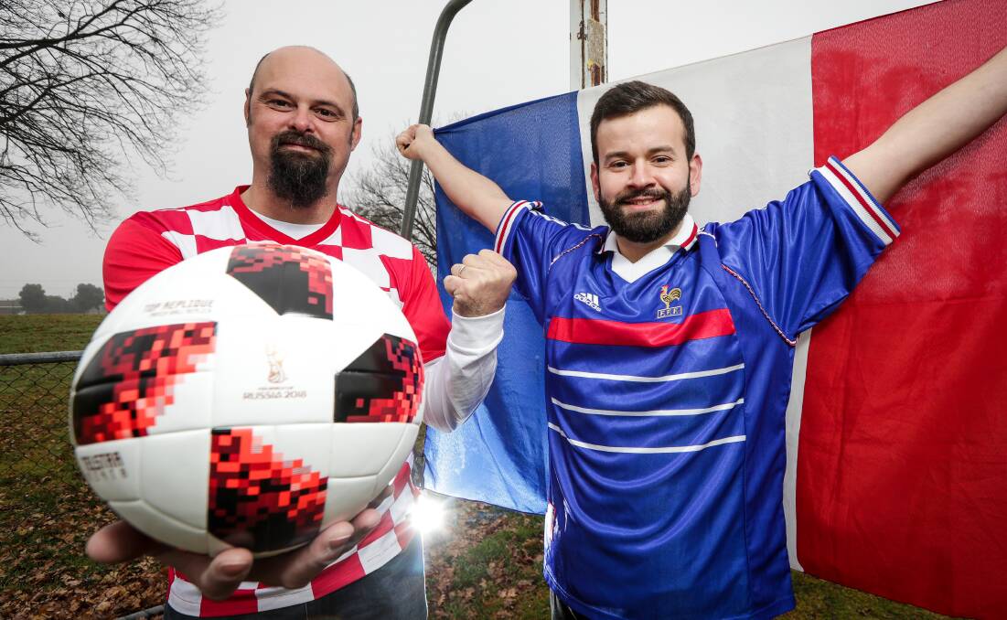 NERVOUS WAIT: Croatia fan Justin Stevens and Frenchman Sylvain Vergos can't wait for the World Cup final. Picture: JAMES WILTSHIRE