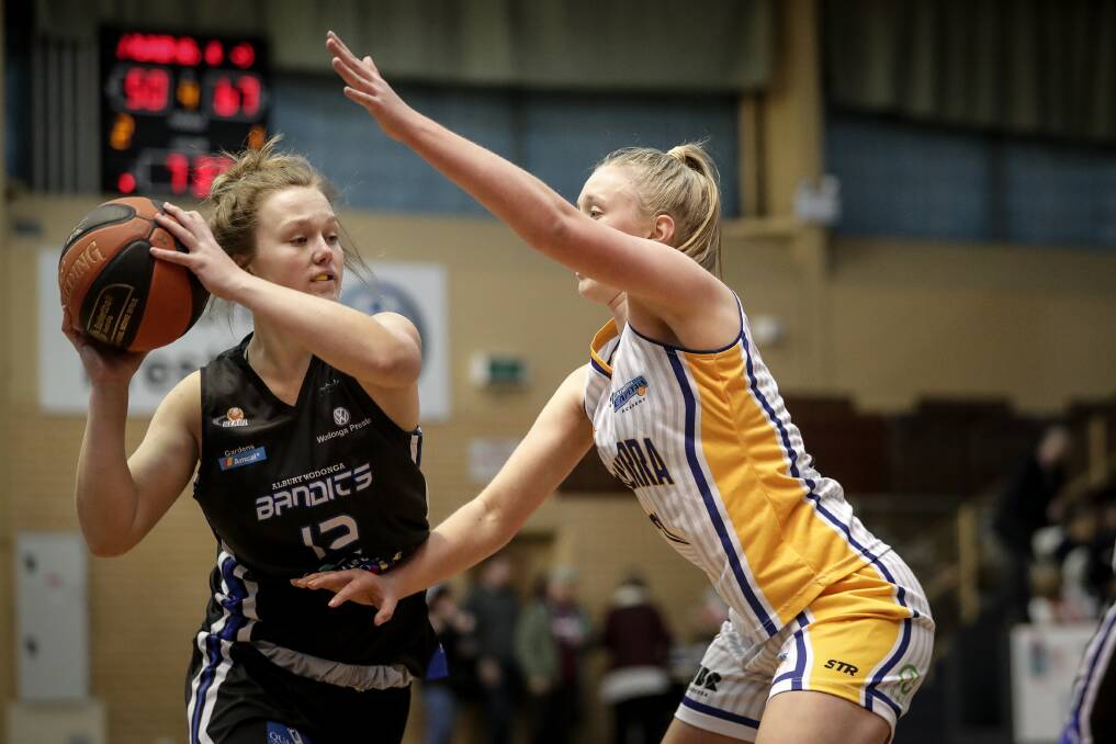 STEPPING UP: A big three from Charlotte Beavan kick-started the fourth quarter run that almost saw the Lady Bandits claim an unlikely victory against the Canberra Capitals Academy. Picture: JAMES WILTSHIRE
