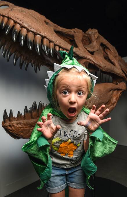 BIGGEST ROAR: Penny Nadebaum, 3, gave her best impression of a tyrannosaurus rex at the exhibit on Saturday. Picture: MARK JESSER
