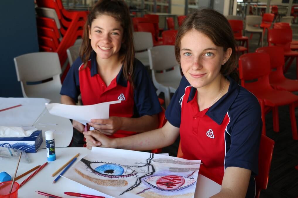 EYE OPENING: Trinity Anglican College year nine students Grace Arney and Sophie Burke take part in the Love Bites program.