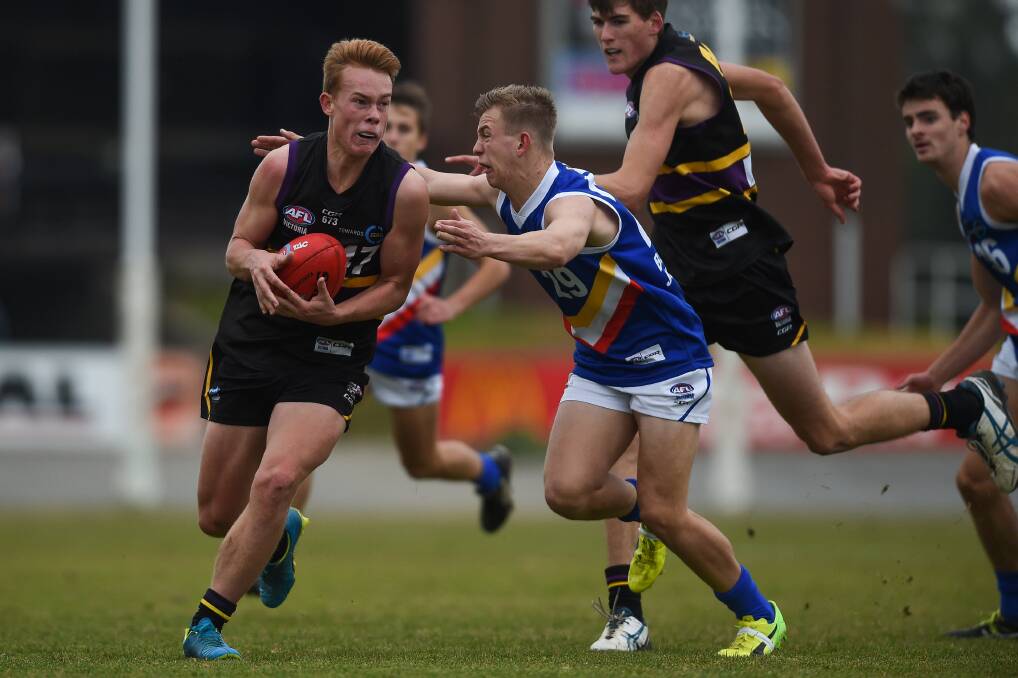 IN AND UNDER: The Murray Bushrangers, including the likes of Noah Amery, are making a name for themselves with hard work around the contest.