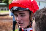 Jockey Reagan Bayliss was exhausted after getting Justiceforall over the line.