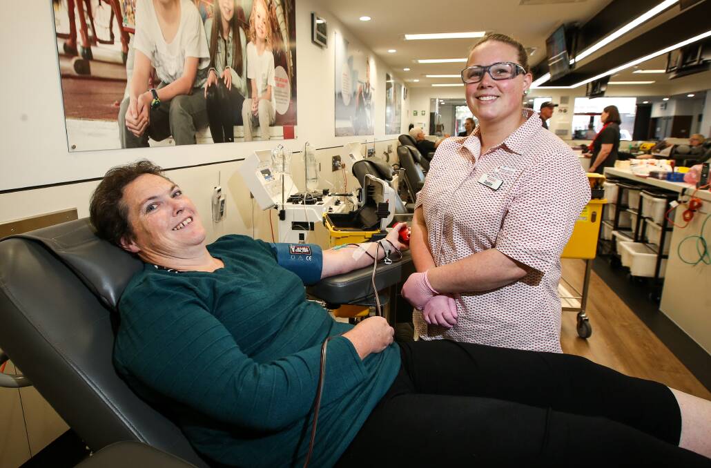 PRECIOUS GIFT: Pam Haysom gives her 47th donation with the help of donor assistant Sophie Vaarzon-Morel. Picture: JAMES WILTSHIRE