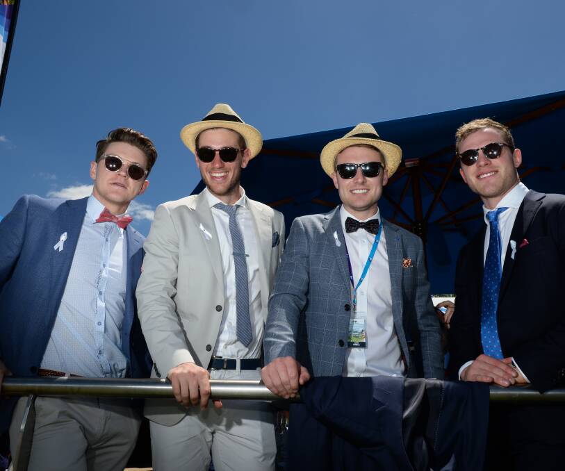 HAPPY HAWKS: Taylor Duryea, Ryan Schoenmakers, Liam Shiels and Tom Mitchell were among the celebrity guests at the Wodonga Cup. Picture: MARK JESSER