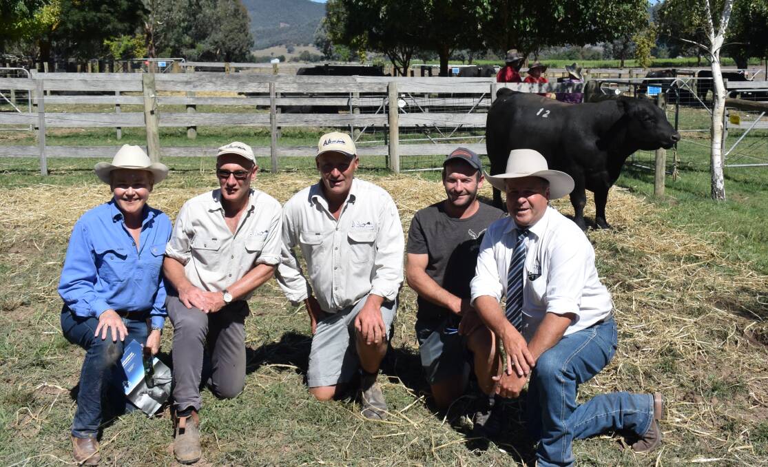 TOP DAY: Suzy Martin, Jim Delany and Chris Oswin, Alpine Angus, with Jake Faithfull, of Corryong, who was an equal top-price buyer at the Rosewhite sale, and auctioneer Michael Glasser, GTSM.
