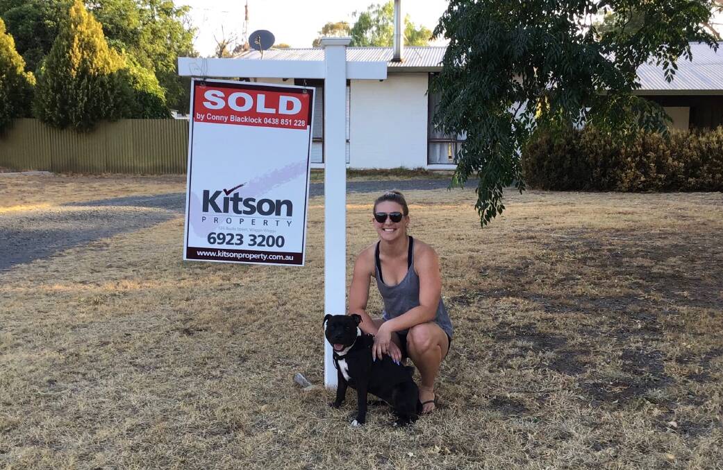 SOLD: Beck Collins is among those in the region satisfied with property prices. She is pictured with her dog Polly. Picture: supplied 