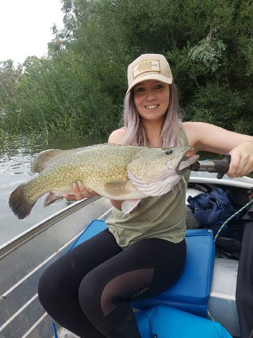 SENSATIONAL: A happy Brooke Kernaghan caught this healthy 58cm Murray cod on cheese. If you want to share your fishing exploits, you can send your fishing pictures, along with a few details, to 0475 947 279 or 0475 953 605.