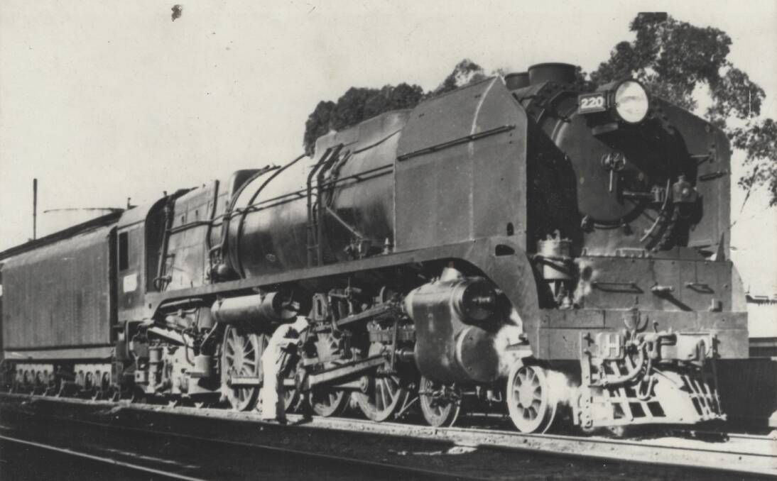 HIStORY: Eric Molloy preparing Heavy Harry. Molloy was among the train drivers living in Wodonga. Picture: Supplied