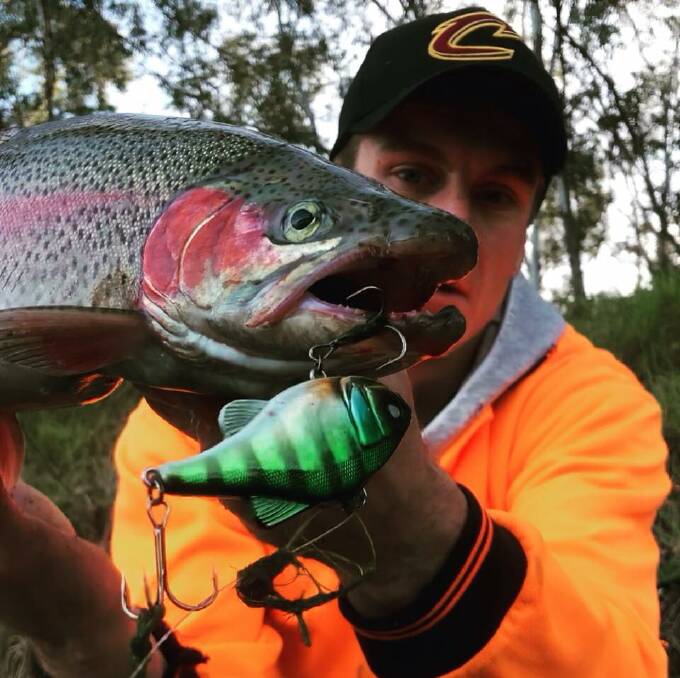 SENSATIONAL: Rhys Wilson landed this spectacular rainbow trout on the Murray. He's the same young bloke who caught some big cod a week or two back.