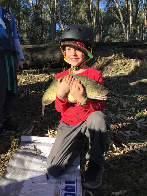 NABBED: Eli Marcuzzi, 7, caught and released his first cod at Easter. He caught it just a minute or two after casting.