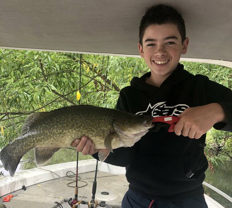 BEAUTY: Riley Piltz managed to outfish his dad at Jingellic, with nine cod and a 74cm carp for the day. Send your pics, along with a few details, to 0475 947 279.