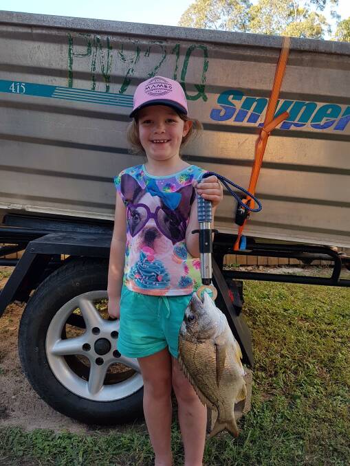 YOU BEAUTY: Young Ruby Clarke, 6, caught this 38 centimetre bream while fishing at the mouth of the Boyne River, Boyne Island and Tannum Sands, Queensland.