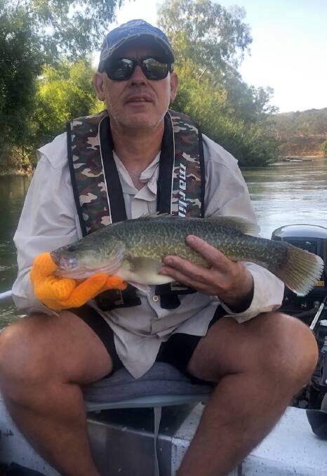 GOOD DAY OUT: Reader Geoff Dean managed to reel in a couple of nice 45s last Saturday afternoon. He was fishing near Kremur Street in Albury.