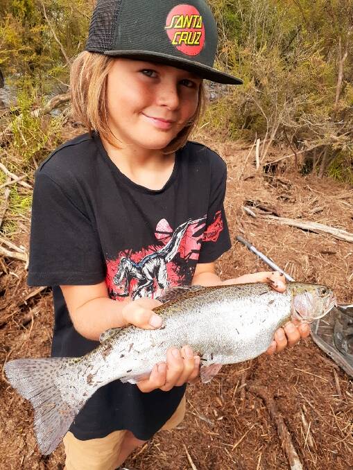 YOU RIPPER: Logan Adlam with a rainbow trout caught while going for a tagged fish at Lake Banimboola on the weekend. To have your catch featured in The Border Mail, send your picture in to 0475 947 279 or 0475 947 279.