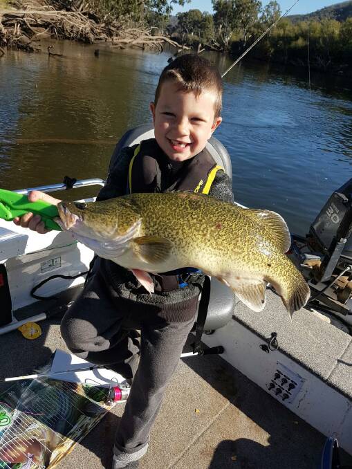 PRIDE: Rhylan Gallacher, 5, caught this 61cm beauty at the Bunyip competition, another PB. Rhylan won the juniors comp and took out the family prize with the same fish.