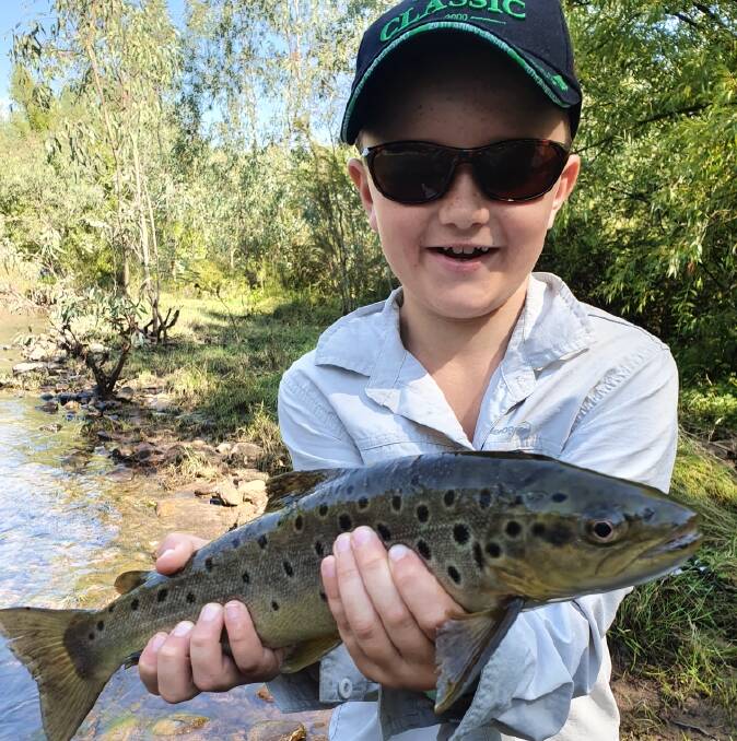 YOU RIPPER: Keen young angler Archie landed this 40 centimetre beauty on a lure while out on the Mitta River for a few hours last Saturday morning.