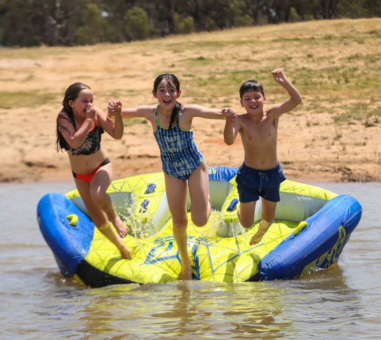 BOMBS AWAY: Mackenzie Kiezenberg, 9, Tayla, 11, and Lachlan Cook, 7. Pictures: JAMES WILTSHIRE