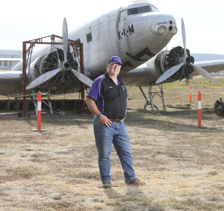 UNDER DECONSTRUCTION: Uiver Memorial Community Trust Chairman Pieter Mol in front of the DC-2 which is being dismantled so it can be restored over a five-year period. Pictures: ELENOR TEDENBORG