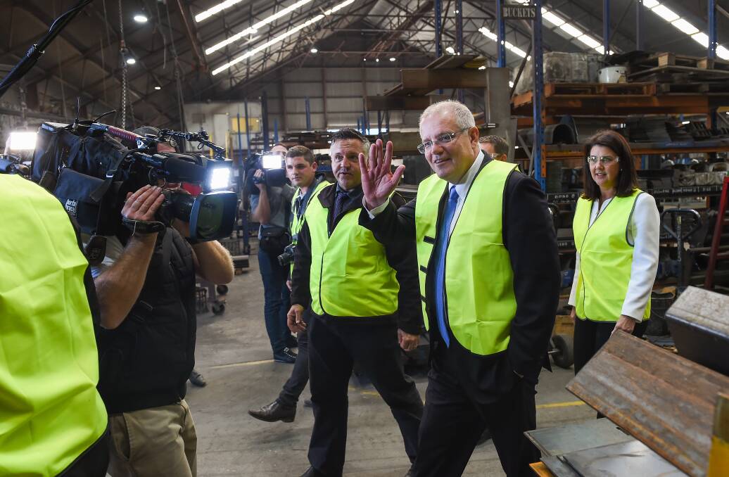INDI-DISPUTE: Prime Minister Scott Morrison tours Burder Industries in Wangaratta with owner adam Fendyk, left. Picture: MARK JESSER