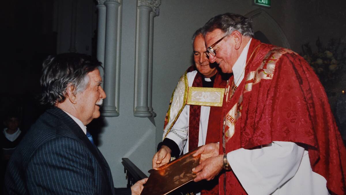 MISSION ACCOMPLISHED: Bishop Beal and the late Maurice Chick, left, at the reconsecration of the church in 1994.
