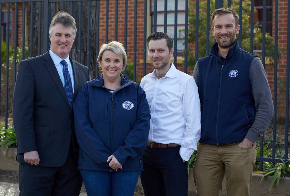 DONE DEAL: Crowe Horwath's Chris Green, Coon's Dairy owner Linda Coon and  Asher Davies and Andrew Dobson from Riverina Fresh which will supply milk to the Albury-Wodonga market from next month.