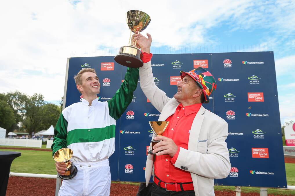 WINNERS ARE GRINNERS: Jockey Sam Clipperton and Gai Waterhouse-Adrian Bott stable racing manager Neil Paine celebrate their Gold Cup win with four-year-old gelding Entente. Pictures: JAMES WILTSHIRE