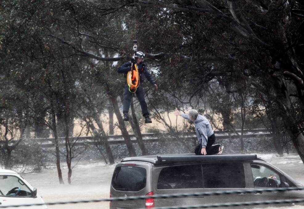 DRAMATIC SCENES: Motorists caught in flash flooding on Hume Freeway were winched to safety in December 2018.