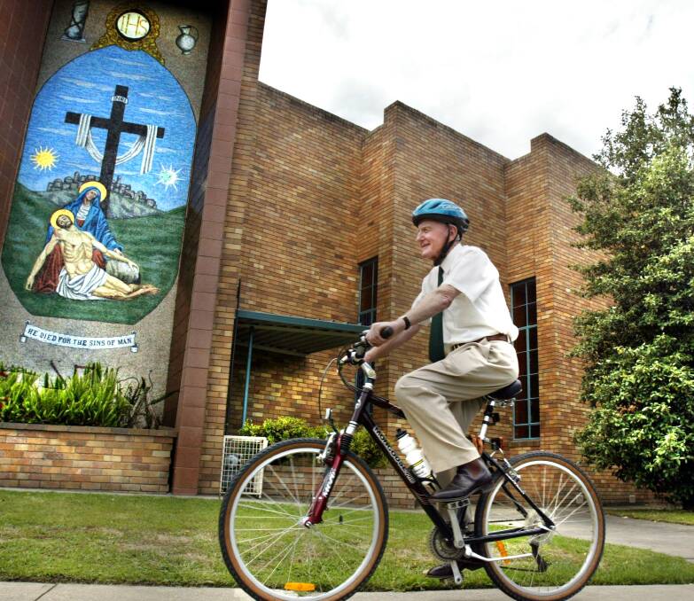 COMEBACK TRAIL: Father Flanagan took to riding a bike as part of his recovery from a heart attack in 2003.
