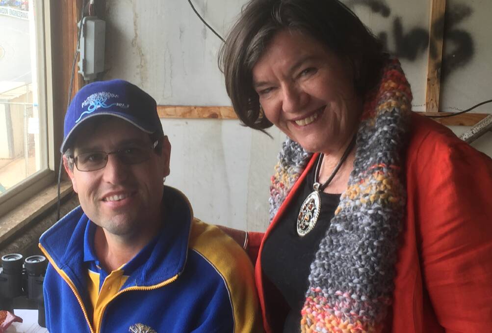 OUT AND ABOUT: Indi MP Cathy McGowan and OAKFM commentator Brendan Rhodes during the Ovens and Murray finals match at Wangaratta.