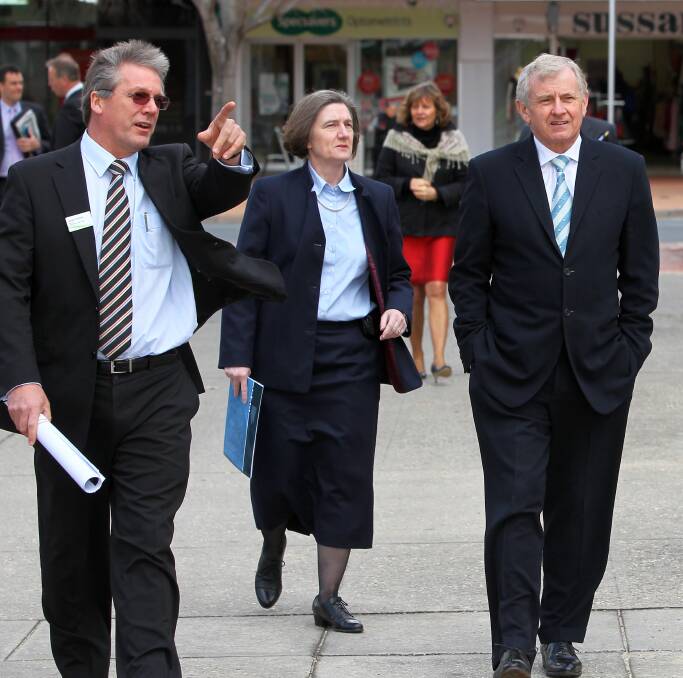 FLASHBACK: Albury Council director James Jenkins, left, leads a tour of QEII Square with ex-mayor Alice Glachan and former Labor federal minister Simon Crean in 2012.