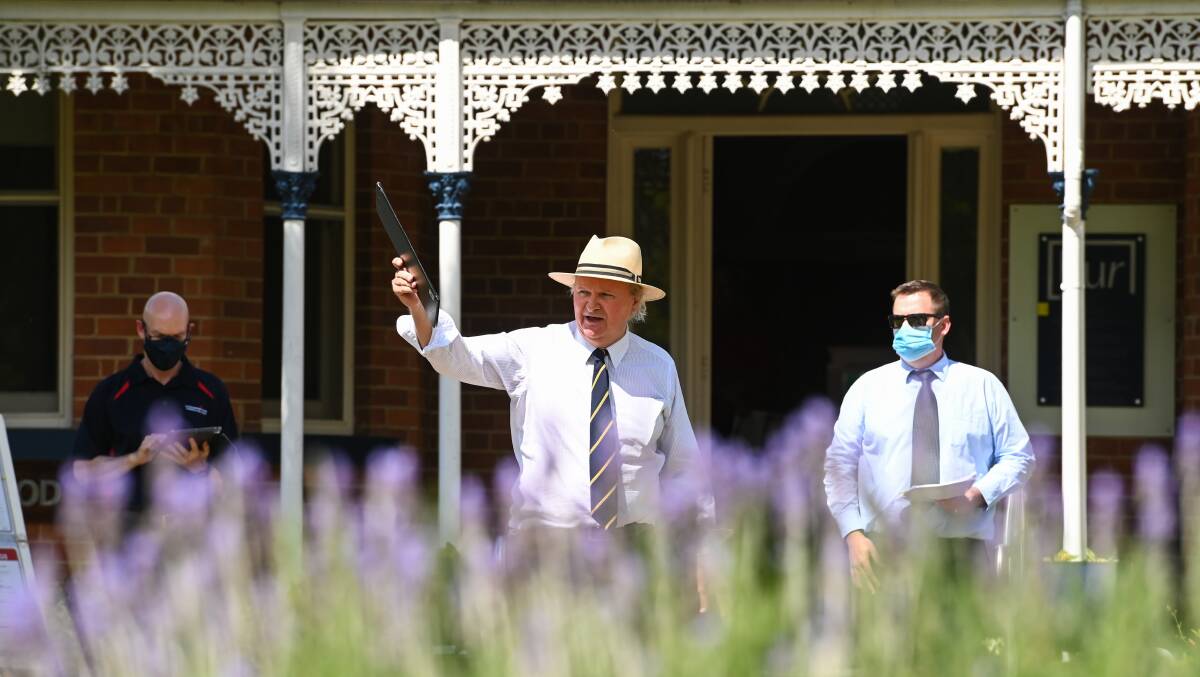 HOT MARKET: Auctioneer Andrew Dixon completes the sale for 640 Olive Street, Albury for $1.505 million. Picture: MARK JESSER